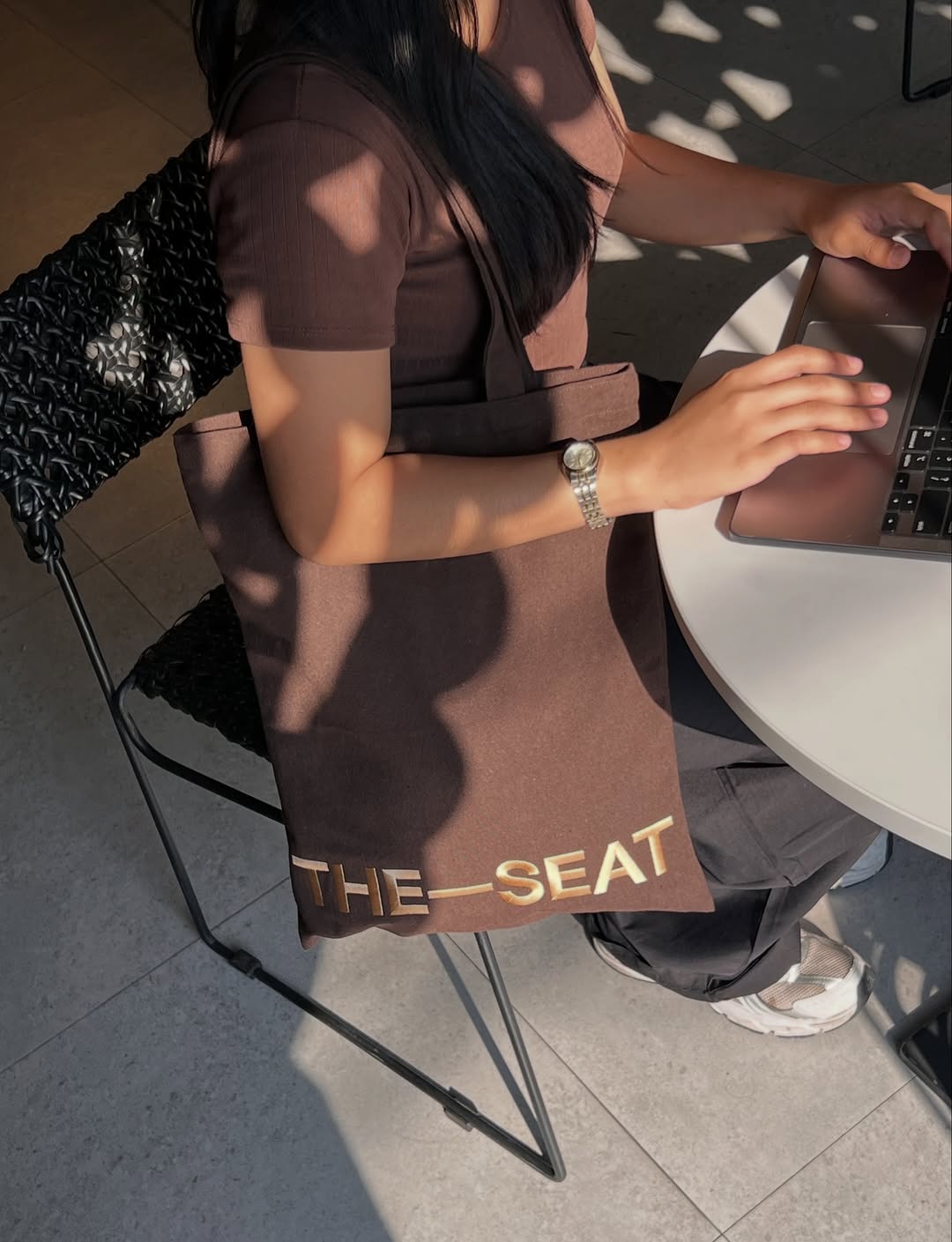 Guest with THE—SEAT tote bag